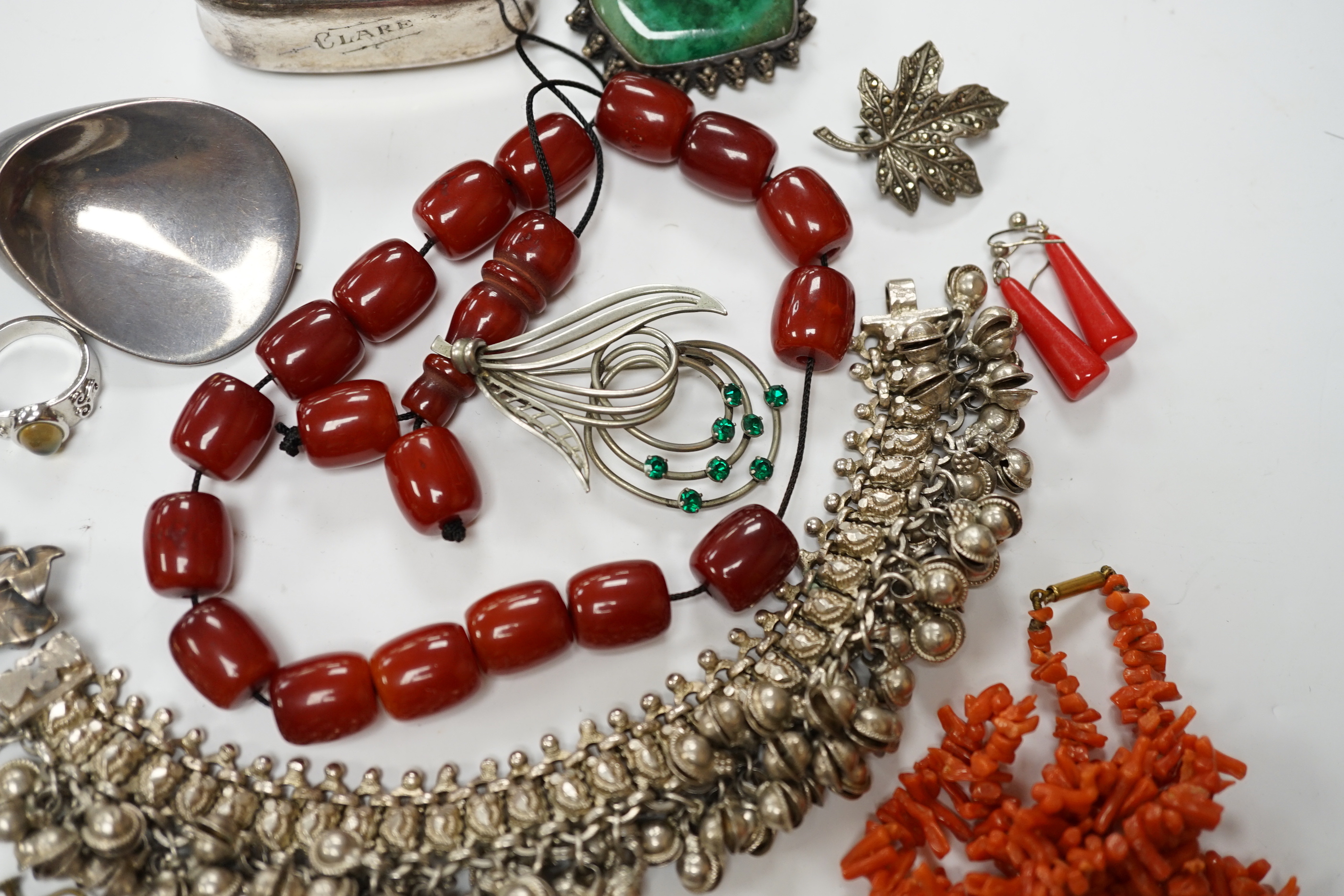 A quantity of assorted jewellery including costume, a pair of Danish sterling ear clips, a 1960's Nanna & Jorgen Ditzel for Georg Jensen sterling silver brooch, no.328, 51mm, a pair of Georg Jensen sterling ear clips, no